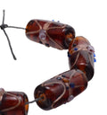 Lampwork Glass Beads: Amber Brown Cylinder & Round Mix with Copper Accents - 8 Bead Strand